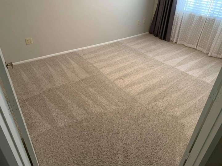 A bright West Valley bedroom with freshly cleaned, striped carpet